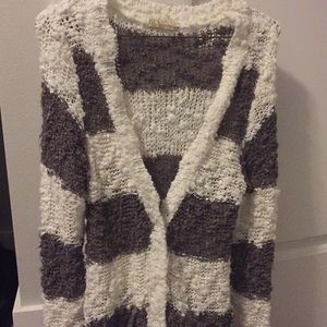 Light brown and white cardigan.